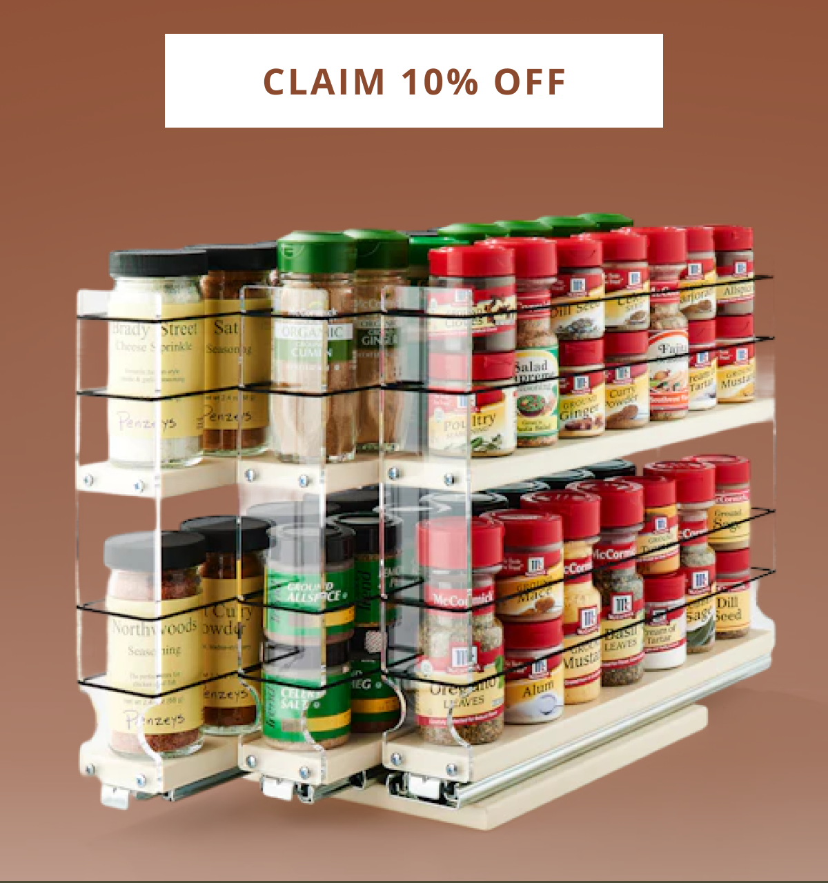 Pull-out spice rack drawer filled with spice jars, showcasing organized storage and easy access inside kitchen cabinets