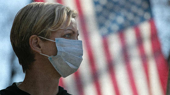 A woman wearing a mask.