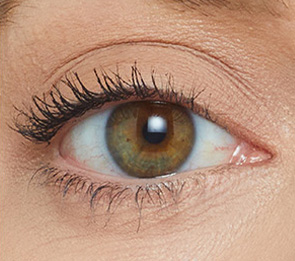 Woman's long lashes immediately after applying Jane Iredale mascara