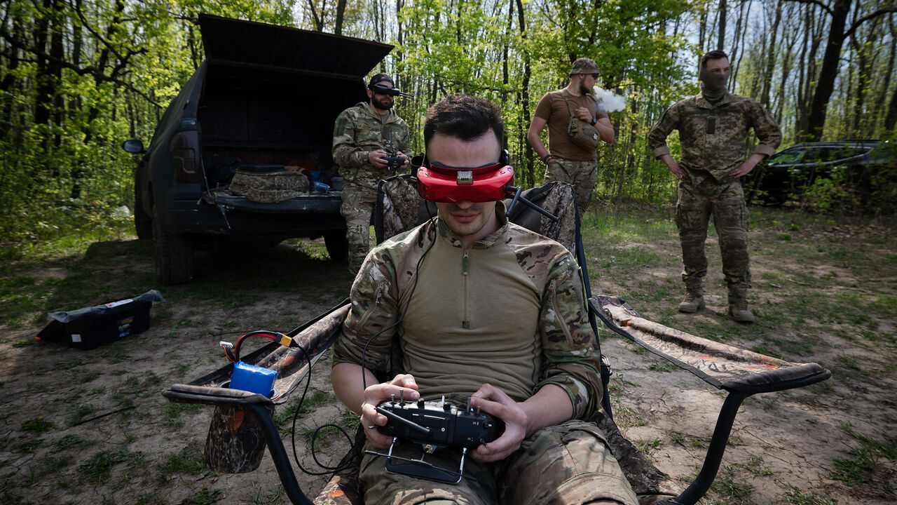 A Ukrainian solder flies a drone in eastern Ukraine.