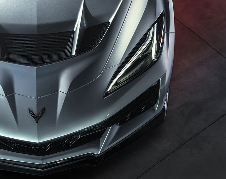 Overhead shot of the ZR1X in Sea Wolf Gray, with a focus on the aerodynamic hood and Corvette logo featured prominently on the hood.