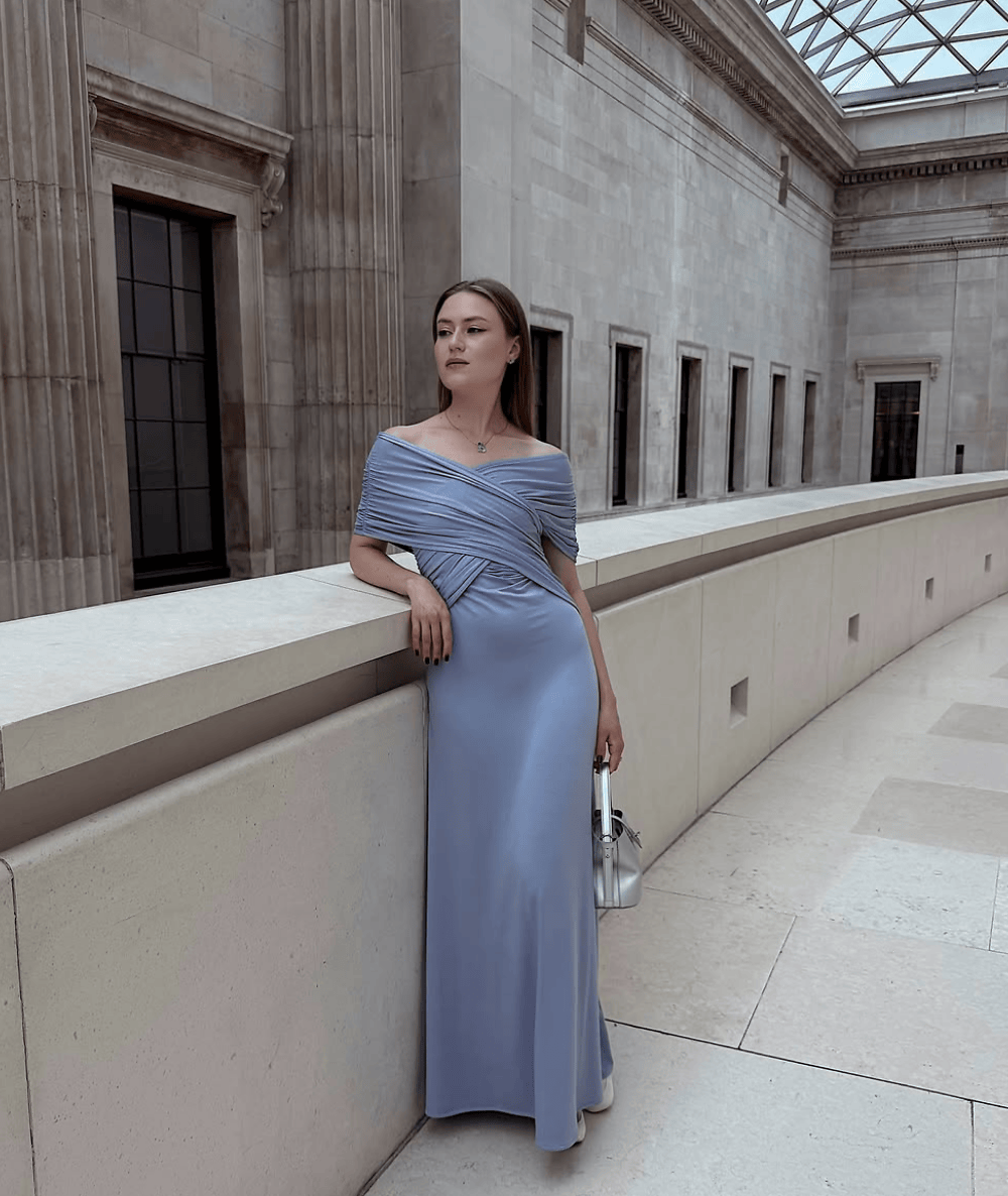 @marie_latte models The Alyssa Infinity Dress styled asymmetrically across one shoulder, priced at $138.