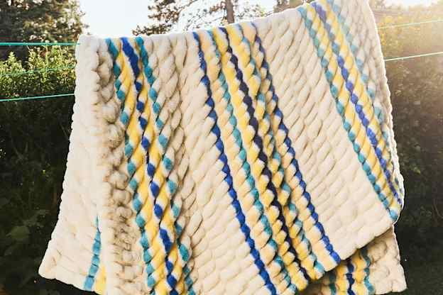 This Luxuriously Soft Blanket Is Just Like That Insta-Famous Option, but Less Expensive (and Comes in Stripes!)