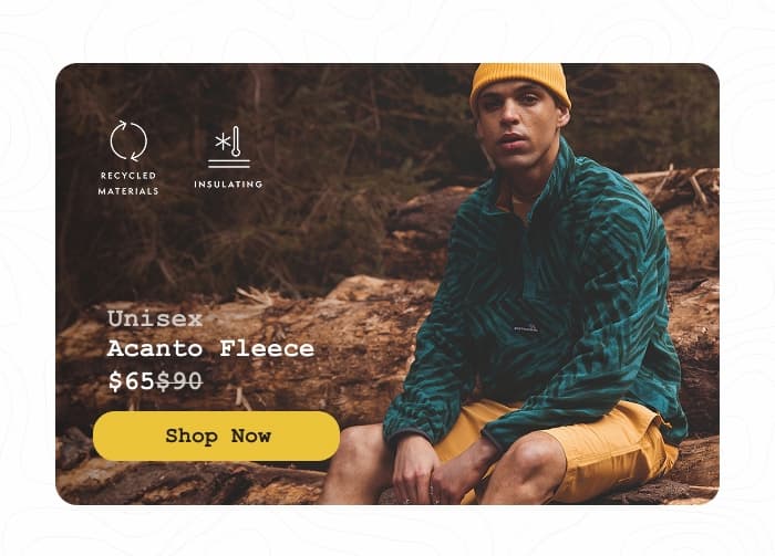 Man sitting on a log while wearing a green Acanto Archive fleece. Shop Now.