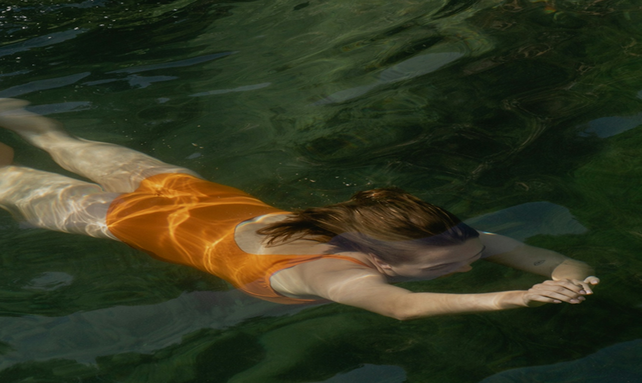 Woman swimming underwater